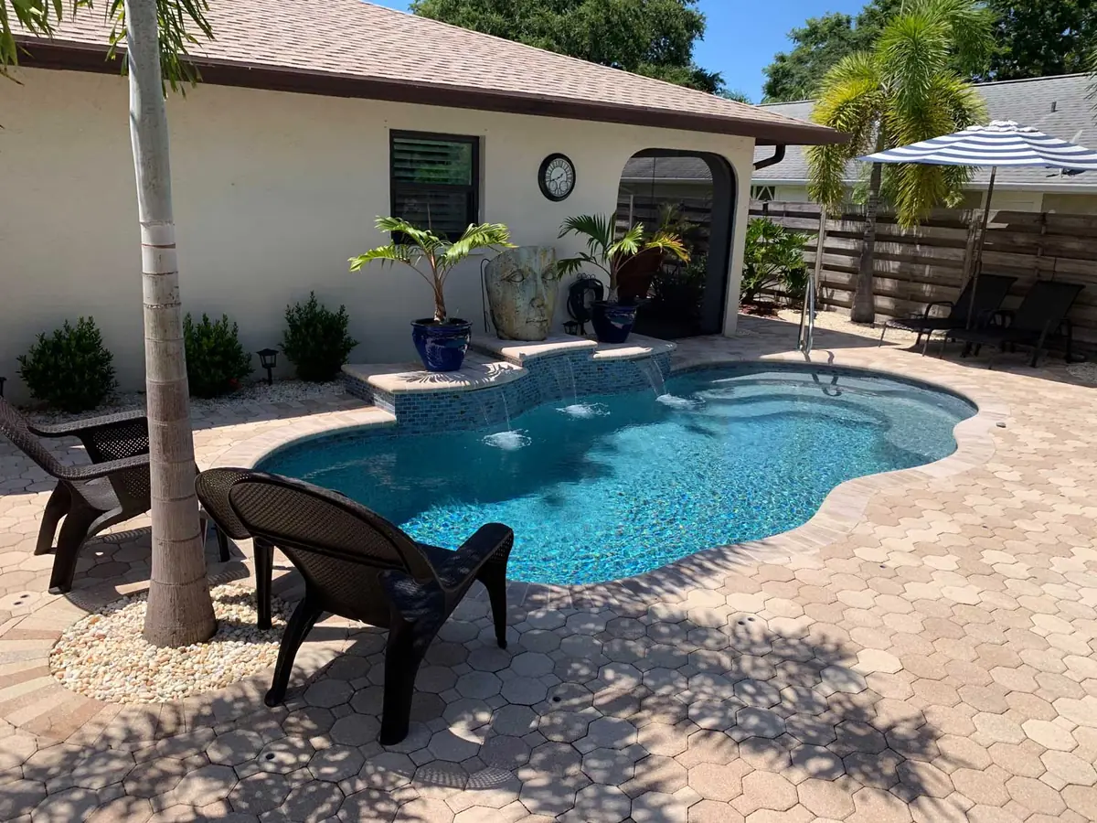 Aruba freeform fiberglass pool installation, view 2