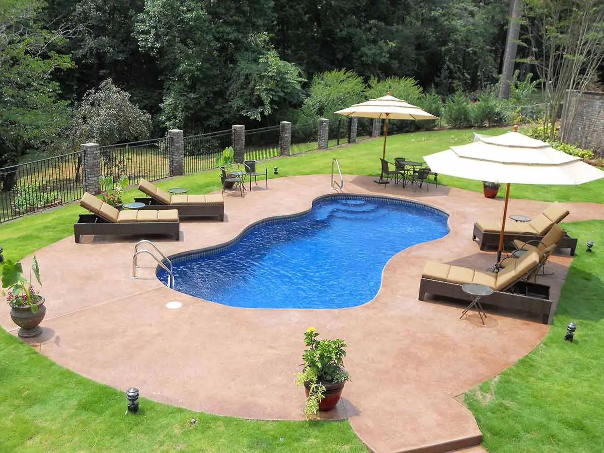 Bay Isle freeform fiberglass pool installation, view 2