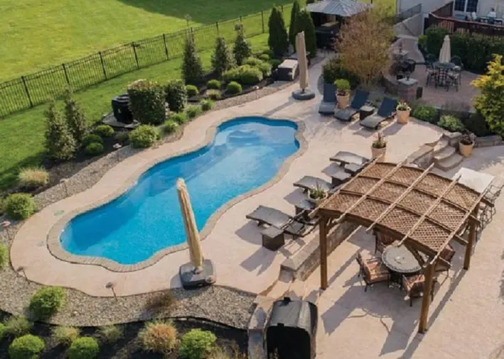 Coronado freeform fiberglass pool installation, view 1